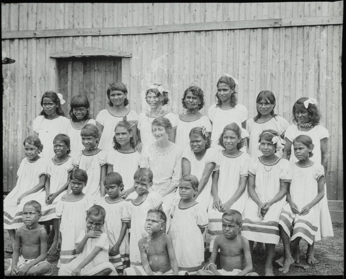 Most of the group of children from the CMS mission at Emerald River, with missionary May Dove